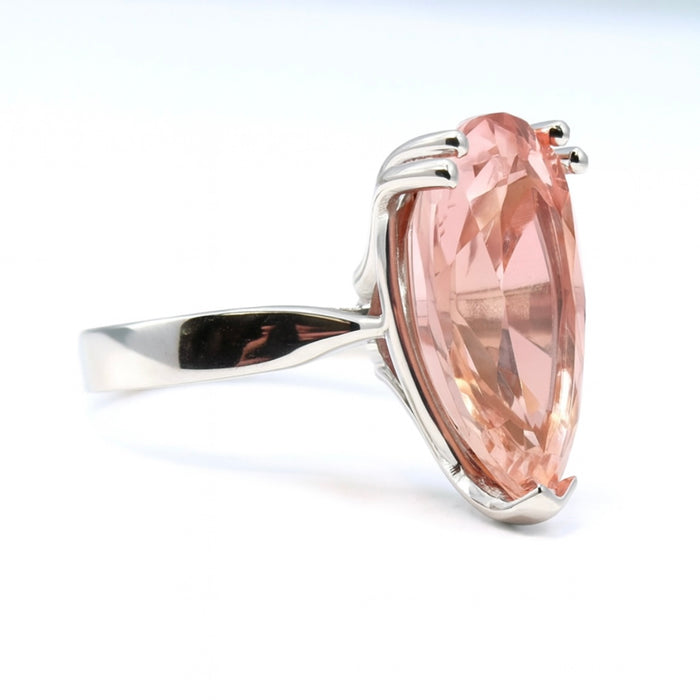 The Rosalind Sapphire — a 16 carat pear-cut pink champagne sapphire ring in hallmarked platinum by The Bardot Collection.